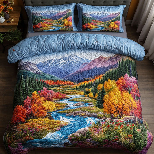 Majestic Mountain Flow quilted 3-piece bedding set on a made bed with two matching pillow shams