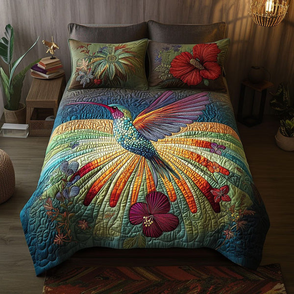 Majestic Nectar quilted 3-piece bedding set on a made bed with two matching pillow shams