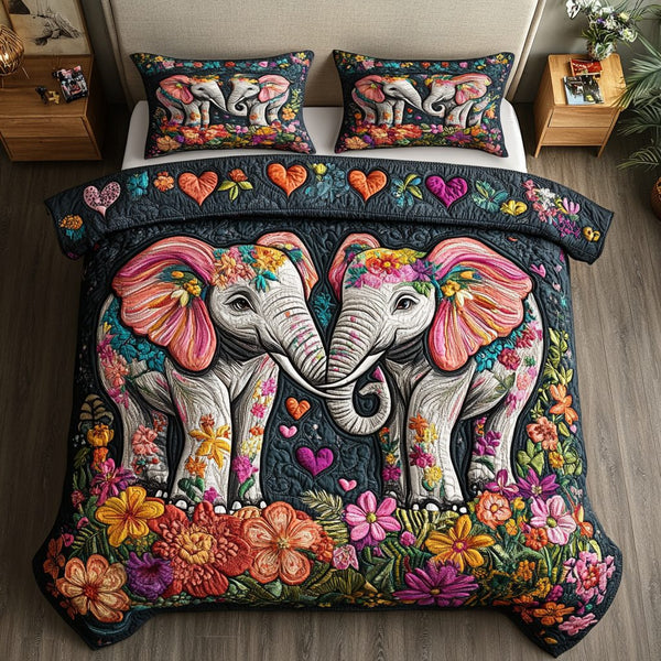 Majestic Pair quilted 3-piece bedding set on a made bed with two matching pillow shams