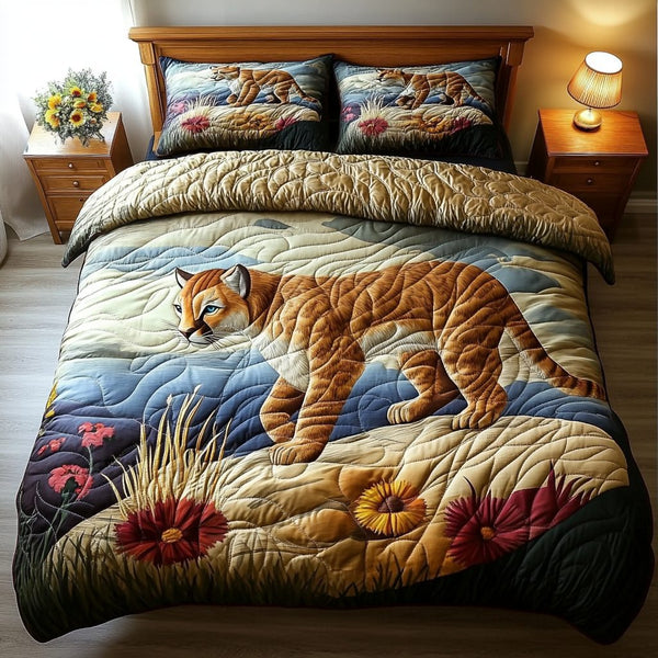 Majestic Pride quilted 3-piece bedding set on a made bed with two matching pillow shams