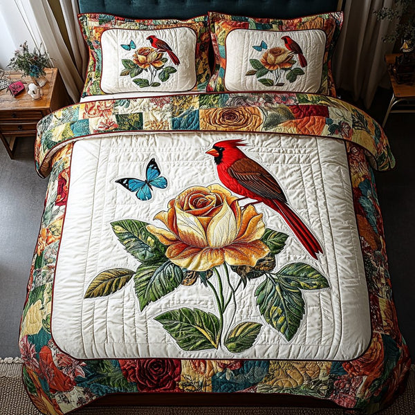 Majestic Redbird quilted 3-piece bedding set on a made bed with two matching pillow shams