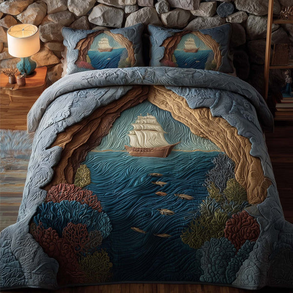 Majestic Ship quilted 3-piece bedding set on a made bed in a light coastal bedroom