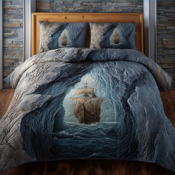 Majestic Ship quilted 3-piece bedding set on a made bed in a light coastal bedroom