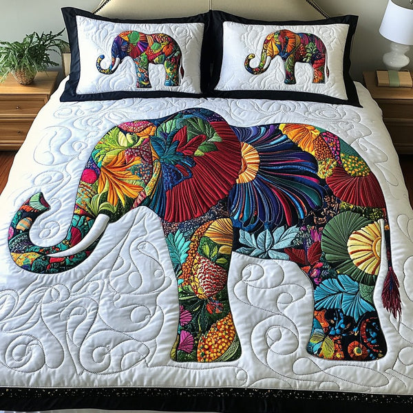 Majestic Tusk quilted 3-piece bedding set on a made bed with two matching pillow shams