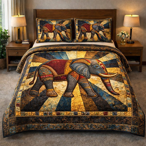 Majestic Tusker quilted 3-piece bedding set on a made bed with two matching pillow shams