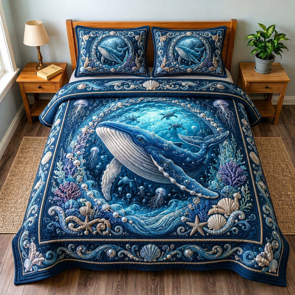 Majestic Whale quilted 3-piece bedding set on a made bed in a light coastal bedroom