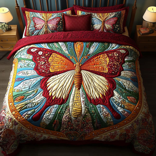 Majestic Wings quilted 3-piece bedding set on a made bed with two matching pillow shams