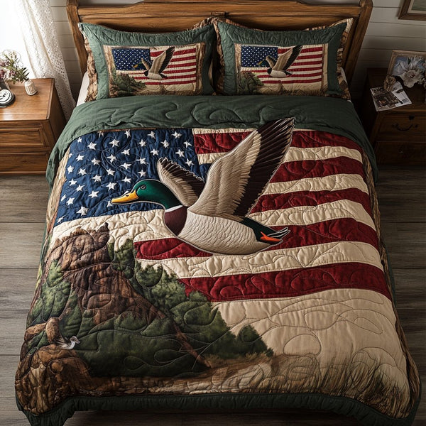 Mallard Ducks Hunt quilted 3-piece bedding set on a made bed with two matching pillow shams