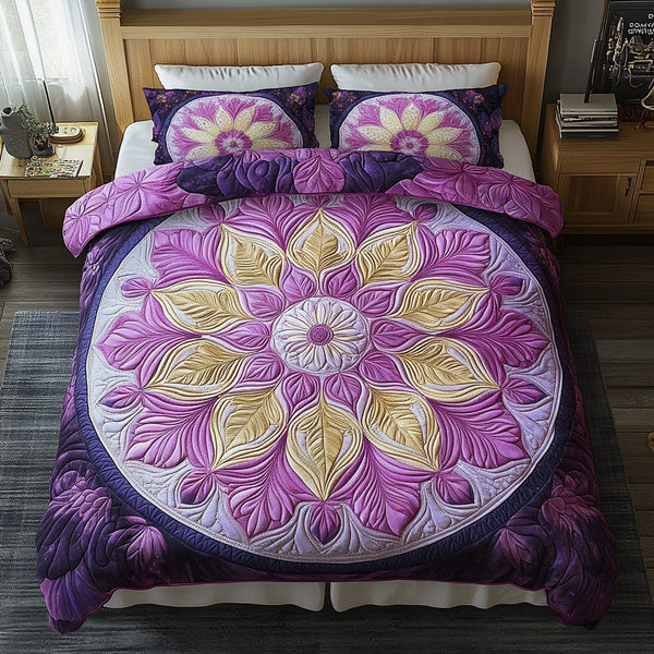 Mandala Essence quilted 3-piece bedding set on a made bed with two matching pillow shams