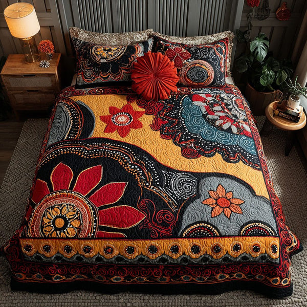 Mandala Journey quilted 3-piece bedding set on a made bed with two matching pillow shams