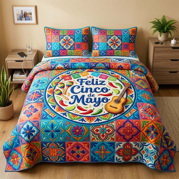 Maraca Vibes quilted 3-piece bedding set on a made bed with two matching pillow shams
