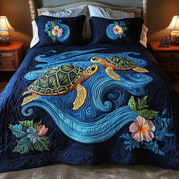 Marine Heartbeats quilted 3-piece bedding set on a made bed in a warmly lit bedroom
