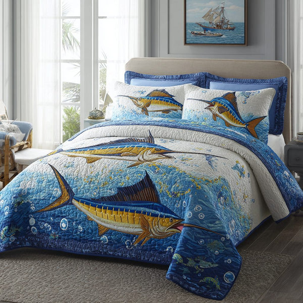 Marlin Horizon quilted 3-piece bedding set on a made bed with two matching pillow shams