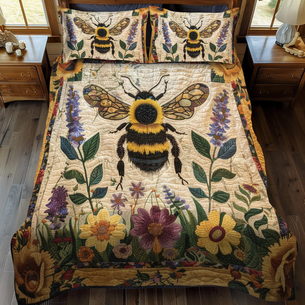 Meadow Bee quilted 3-piece bedding set on a made bed with two matching pillow shams