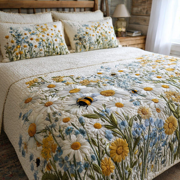 Meadow Bees quilted 3-piece bedding set on a made bed with two matching pillow shams
