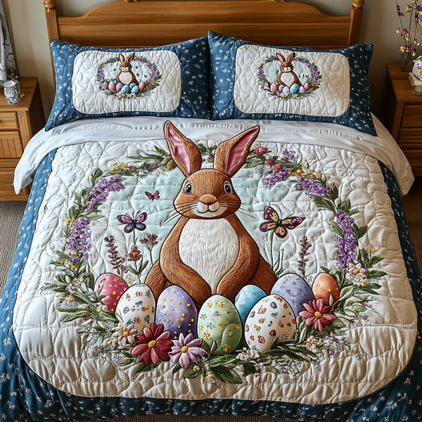 Meadow Bloom quilted 3-piece bedding set on a made bed with two matching pillow shams