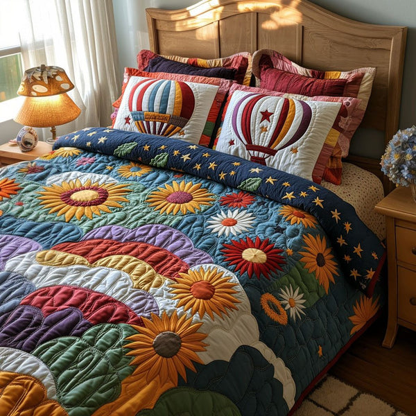 Meadow Breeze Balloons quilted 3-piece bedding set on a made bed with two matching pillow shams
