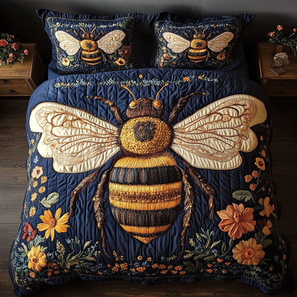 Meadow Buzz quilted 3-piece bedding set on a made bed with two matching pillow shams