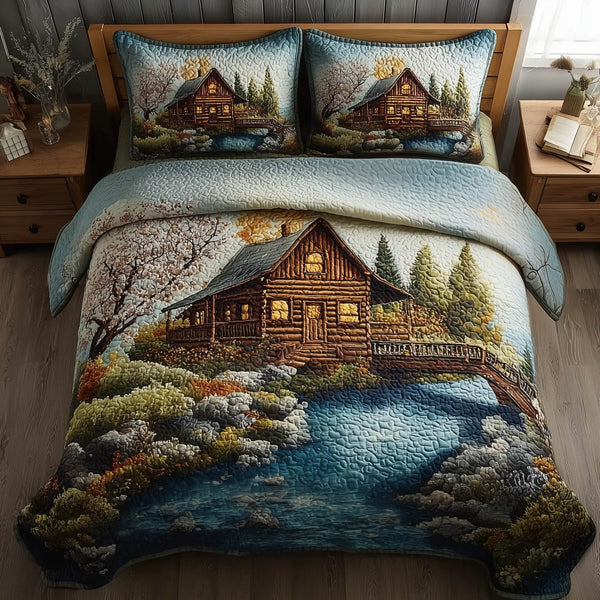 Meadow Cabin quilted 3-piece bedding set on a made bed with two matching pillow shams