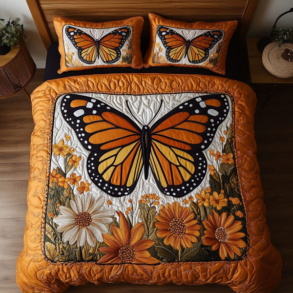 Meadow Dancer quilted 3-piece bedding set on a made bed with two matching pillow shams
