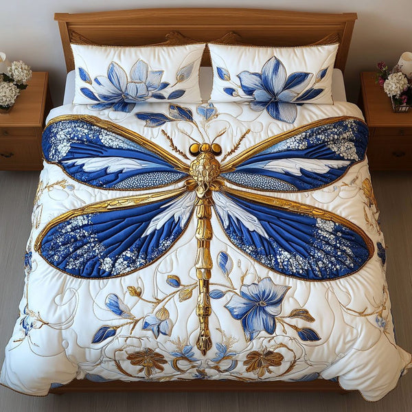 Meadow Dancer quilted 3-piece bedding set on a made bed with two matching pillow shams