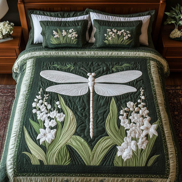 Meadow Flight quilted 3-piece bedding set on a made bed with two matching pillow shams