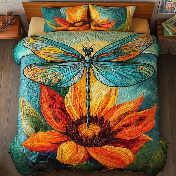 Meadow Flight quilted 3-piece bedding set on a made bed with two matching pillow shams