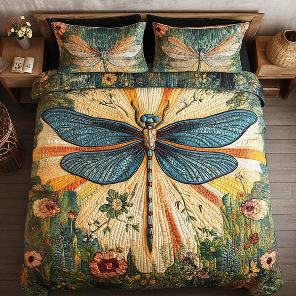 Meadow Flight quilted 3-piece bedding set on a made bed with two matching pillow shams