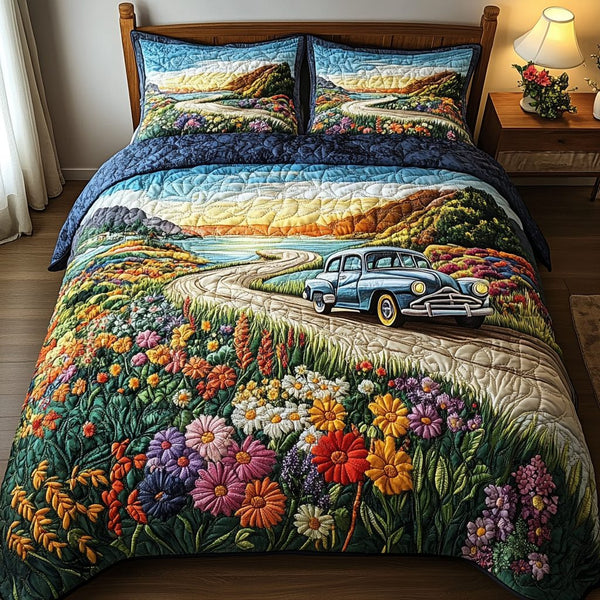 Meadow Glow quilted 3-piece bedding set on a made bed with two matching pillow shams