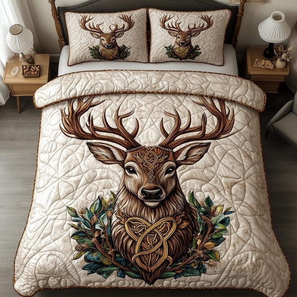 Meadow Monarch quilted 3-piece bedding set on a made bed with two matching pillow shams