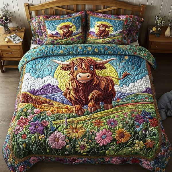 Meadow Sunrise quilted 3-piece bedding set on a made bed with two matching pillow shams