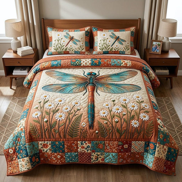 Meadow Wings quilted 3-piece bedding set on a made bed with two matching pillow shams