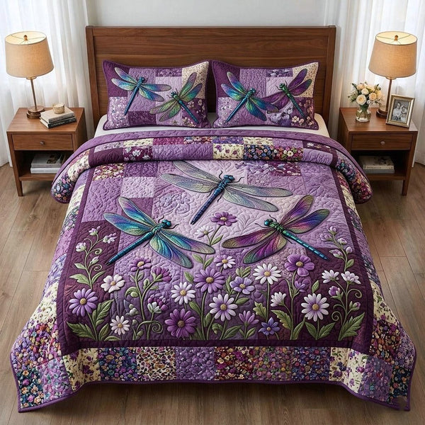 Meadow Wings quilted 3-piece bedding set on a made bed with two matching pillow shams