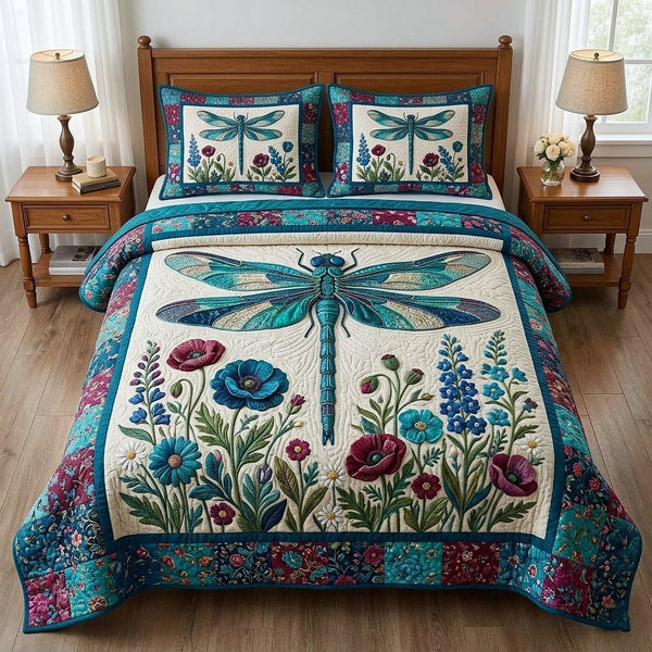 Meadow Wings quilted 3-piece bedding set on a made bed with two matching pillow shams