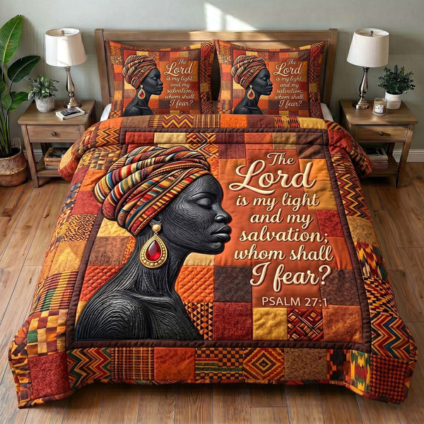 Melanin Grace quilted 3-piece bedding set on a made bed with two matching pillow shams