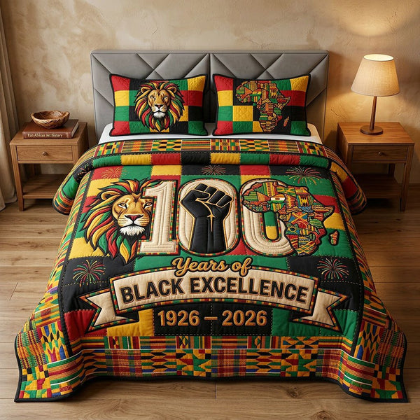 Melanin Legacy quilted 3-piece bedding set on a made bed with two matching pillow shams
