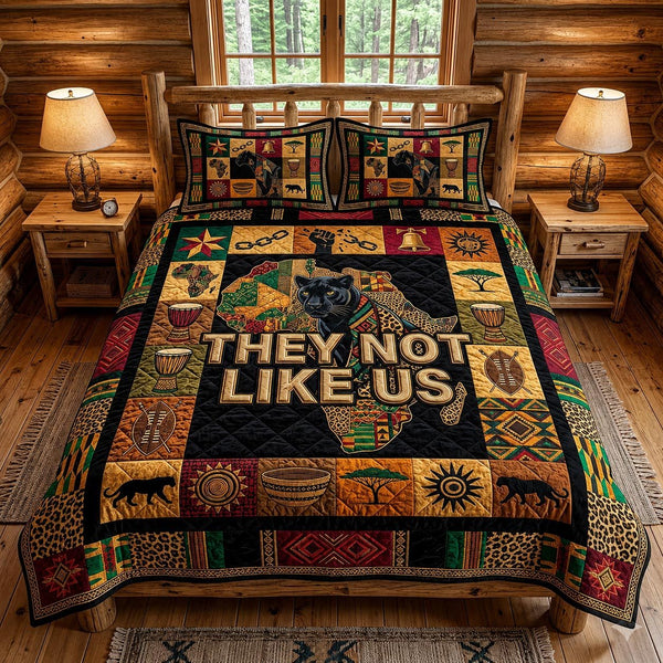 Melanin Pride quilted 3-piece bedding set on a made bed with two matching pillow shams