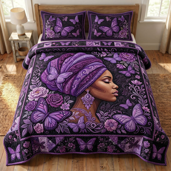 Melanin Queen quilted 3-piece bedding set on a made bed with two matching pillow shams