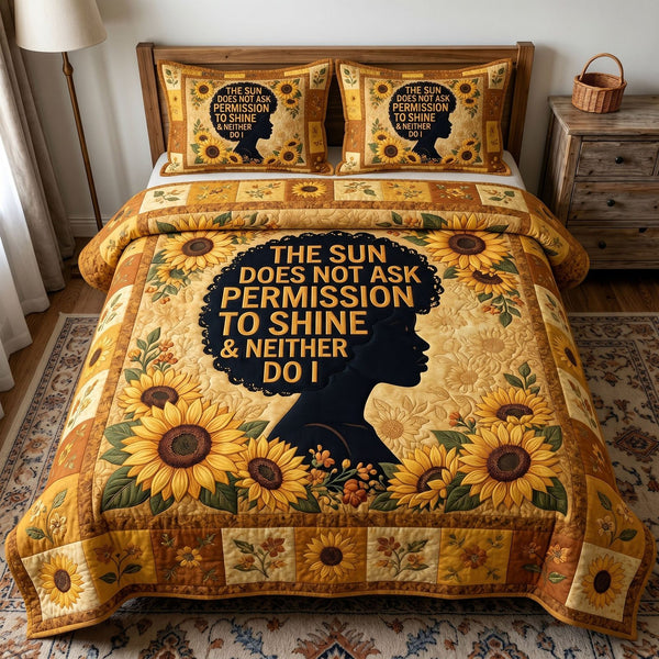 Melanin Queen quilted 3-piece bedding set on a made bed with two matching pillow shams