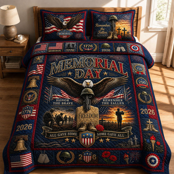 Memorial Day quilted 3-piece bedding set on a made bed with two matching pillow shams