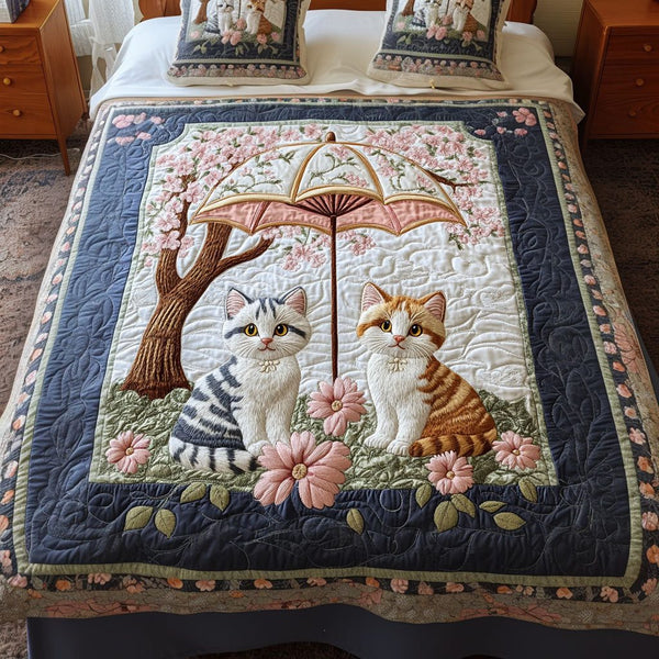 Meow Harmony quilted 3-piece bedding set on a made bed with two matching pillow shams