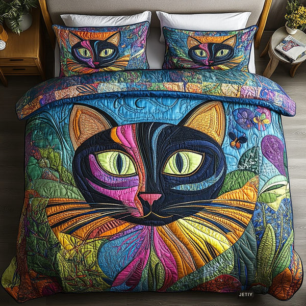 Meow Magic quilted 3-piece bedding set on a made bed with two matching pillow shams