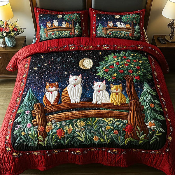 Meow Magic quilted 3-piece bedding set on a made bed with two matching pillow shams