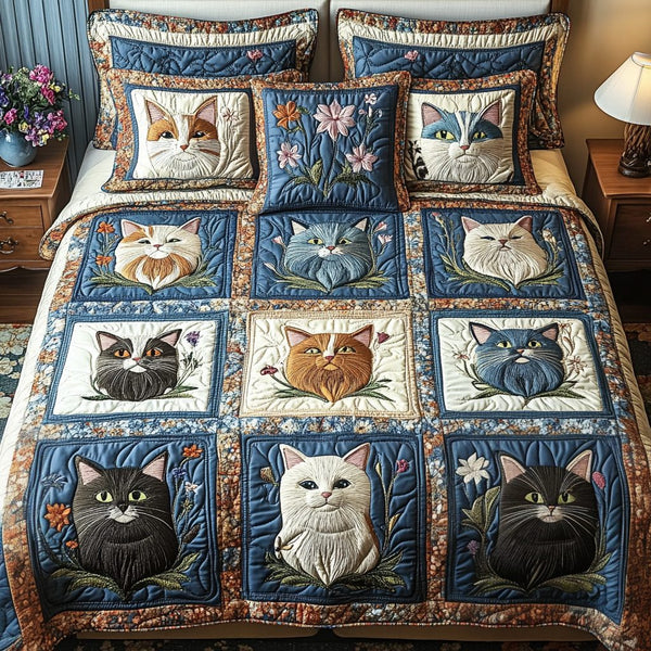 Meow Meadow quilted 3-piece bedding set on a made bed with two matching pillow shams