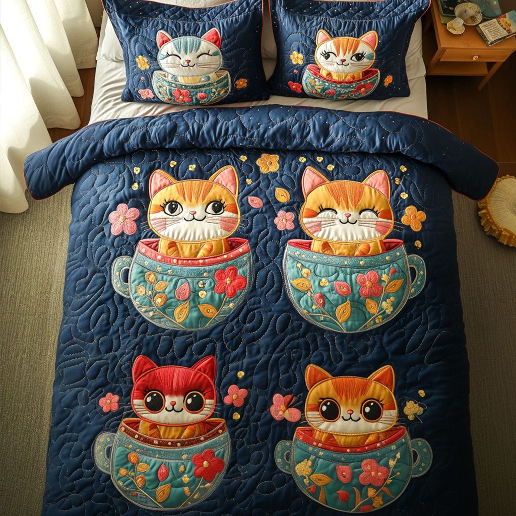 Meow Tea Party quilted 3-piece bedding set on a made bed with two matching pillow shams