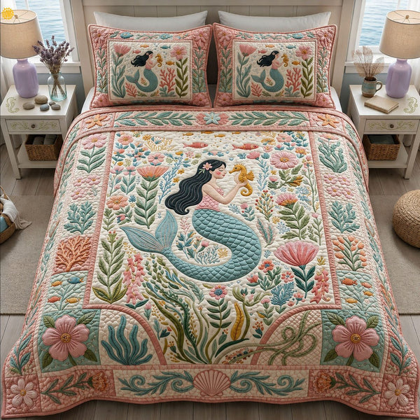 Mermaid And Seahorse quilted 3-piece bedding set on a made bed in a light coastal bedroom