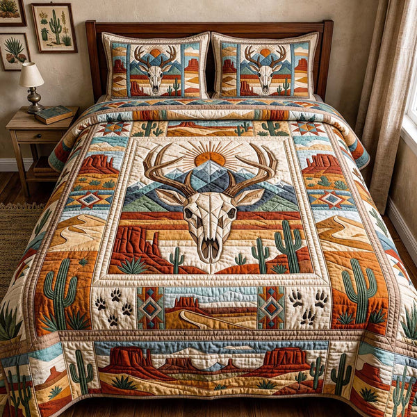 Mesa Antlers quilted 3-piece bedding set on a made bed with two matching pillow shams