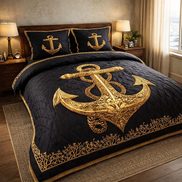 Midnight Anchor quilted 3-piece bedding set on a made bed in a light coastal bedroom