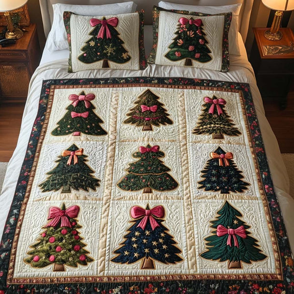 Midnight Bow quilted 3-piece bedding set on a made bed with two matching pillow shams