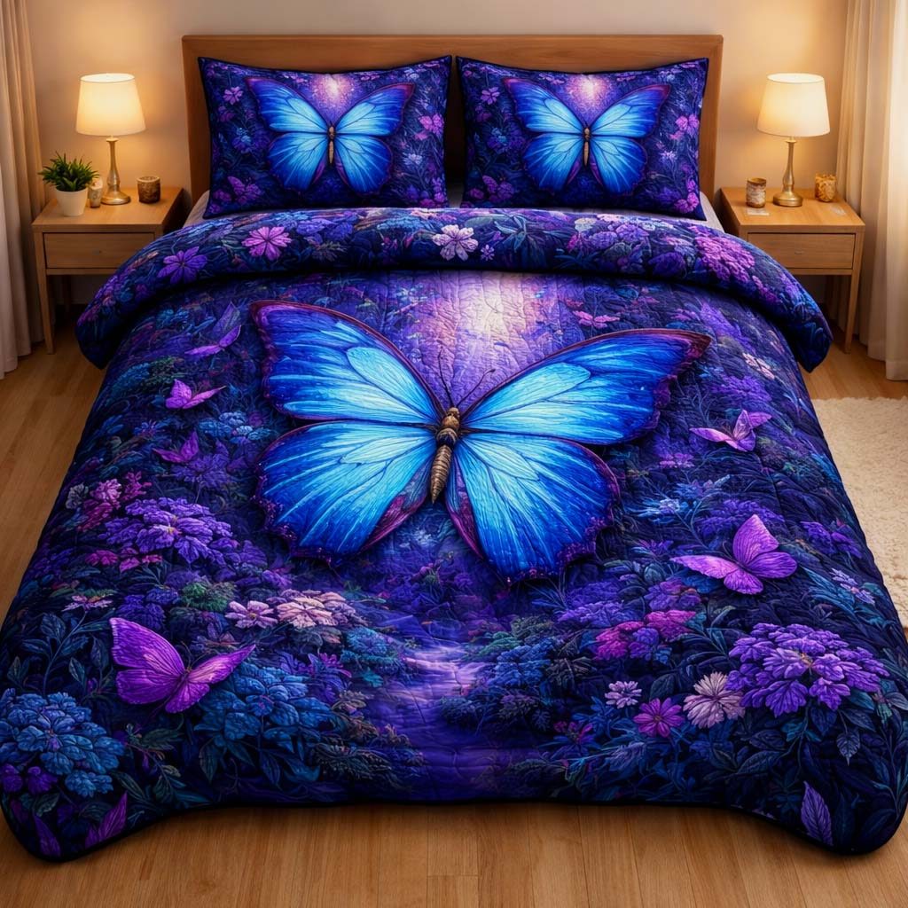 Midnight Butterfly quilted 3-piece bedding set on a made bed with two matching pillow shams